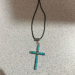 Beautiful teal cross necklace